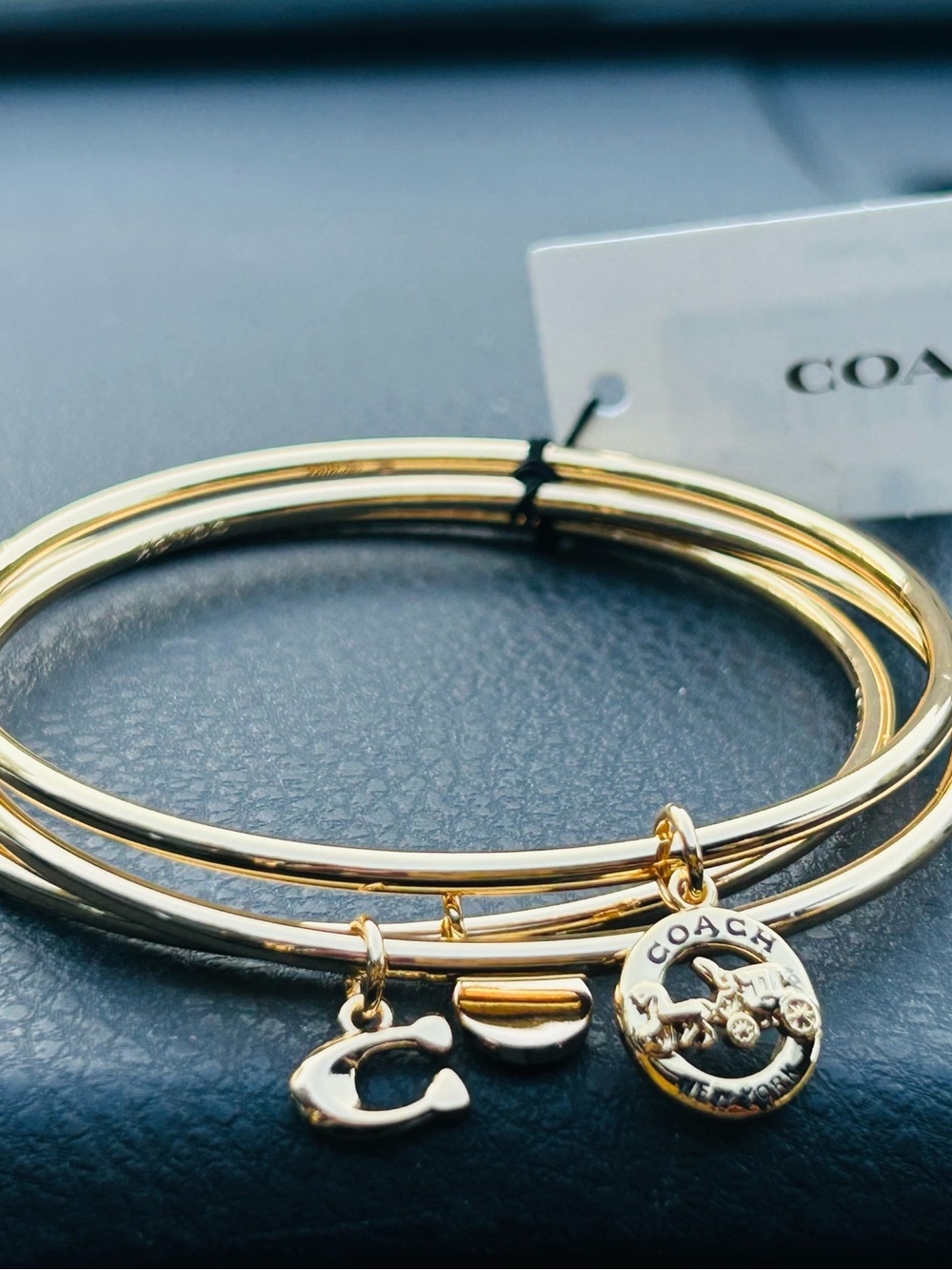 Coach Gold-Tone Stackable Charm Bangle Set